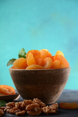 Mix of dried and sun-dried fruits,  in a wooden trays . View from above. Symbols of the Jewish holiday of Tu BiShvat
