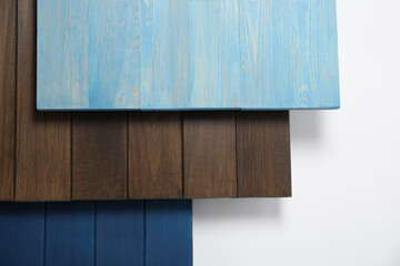 Different wooden surfaces for photography on white background, top view