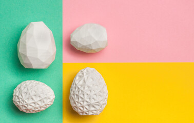 White Easter eggs with geometric patterns on colorful background