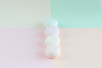 Bright and beautiful multi-colored desserts on pastel backgrounds Macaroons. Marshmallows. delicious breakfast. Beautiful healthy food. Background. Atelier