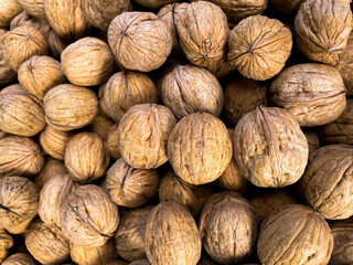 Walnuts on the market or harvest festival. Overhead view