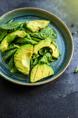 avocado salad fried grilled and lettuce spinach arugula snack barbecue vegetables ready to eat on the table for healthy meal outdoor top view copy space text food background rustic image 