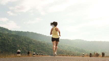 Empty road with running girl in background