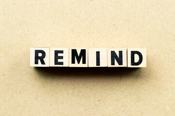 Obraz premium Alphabet letter block in word remind on wood background