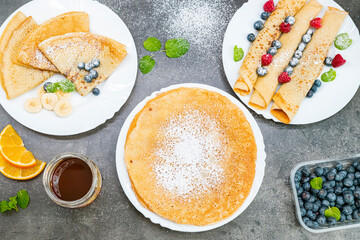 Pancakes with fresh berry, sweet homemade food. Top view table. Delicious breakfast meal