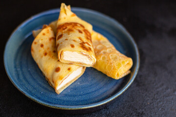 pancakes flapjack thin cake curd filling crepe cottage cheese ricotta Pancake week sweet dessert vanilla cream on the table for meal snack outdoor top view copy space for text food background