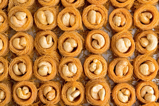 small baklava pieces with syrup and caseous on a close look