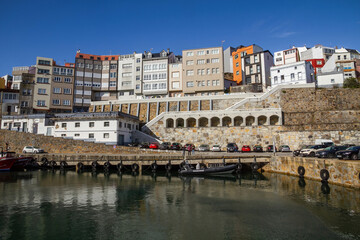 Partial view of the fishing and tourist town of Malpica in front of the port. Galicia. Spain