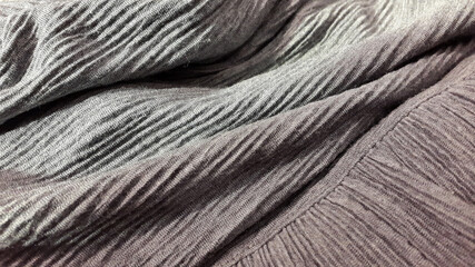 Fabric folds. Vintage background from crumpled fabric