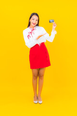 Portrait beautiful young asian woman with credit card