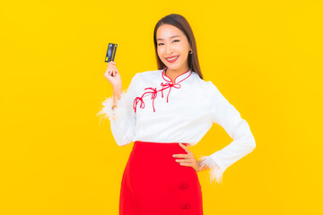 Portrait beautiful young asian woman with credit card