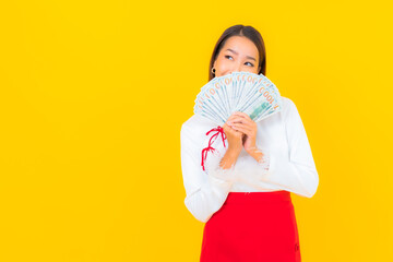 Portrait beautiful young asian woman with a lot of cash and money