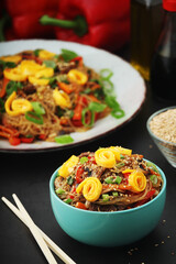 Japchae, a sweet and savory dish of stir-fried glass noodles, Korean cuisine