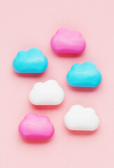 cute clouds on a pink background. baby or newborn background