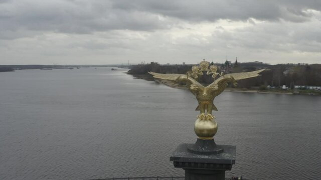 Drone flies over the Monument to the 1000th anniversary of Yaroslavl, two-headed eagle sculpture, Embankment of the city of Yaroslavl, Strelka, River Koh
torsl flows into the Volga River