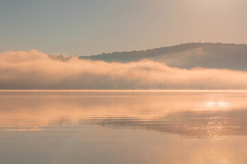 Morning mist over the lake. Vlasina lake, Eastern Serbia