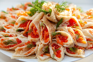 Russian pancakes, traditional for Russian pancake week with red cavier