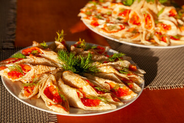 Russian pancakes, traditional for Russian pancake week with red cavier