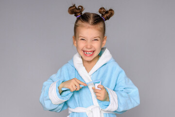 happy baby girl with toothbrush, teeth and smiles