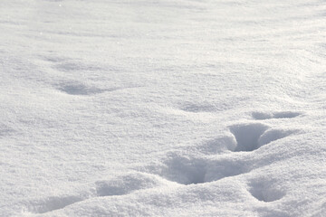 Fototapeta na wymiar Background with white snow. Snow drifts, hills and mountains.