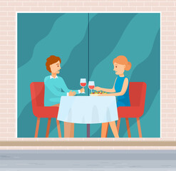 Lovers on a date in a restaurant. Married couple celebrate the holiday together. Man and woman sitting at the table and drinking red wine, people communicating on a date. Nice family evening