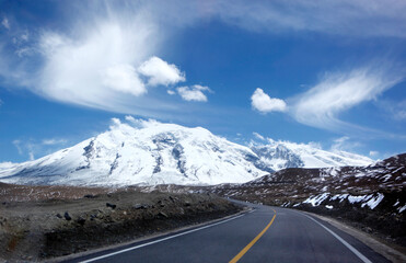 Tibet snow mountain and road