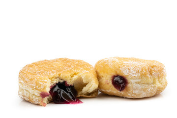 Traditional Polish donuts isolated on white background.doughnuts with jam Blueberry shell