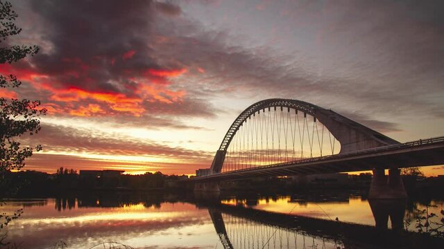 Lusitania Bridge in M&eacute;rida,Badajoz, Extremadura, Spain timelapse reel during beautiful sunset at the Guadiana river.