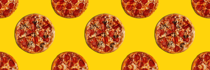 Two differerent pizzas seamless pattern banner on yellow surface.