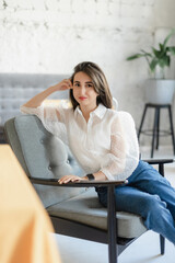 woman sitting on a chair