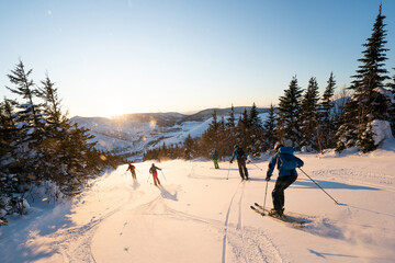Group of friends skiing in the Chic Chocs in Quebec Canada - obrazy, fototapety, plakaty