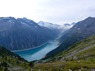 Fototapeta na wymiar Schlegeisspeicher reservoir at Berlin high path, Zillertal Alps in Tyrol, Austria