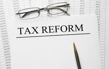 Paper with Tax Reform on a table