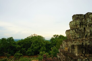 Fototapeta premium Phnom Bakheng Temple and aerial view from the temple in Siem Reap, Cambodia, Ancient Khmer architecture.