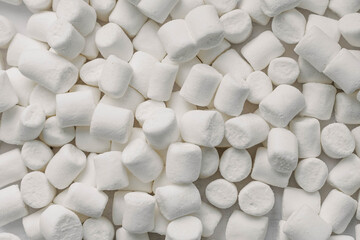 Fototapeta na wymiar Marshmallows. Background or texture of white mini marshmallows.