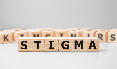 Word STIGMA made with wood building blocks