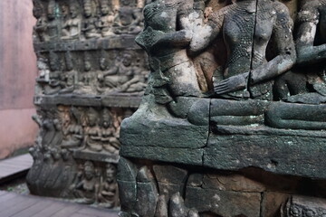 Fototapeta na wymiar Bas relief at Elephant Terrace , Angkor Thom in Siem Reap, Cambodia, Ancient Khmer architecture.
