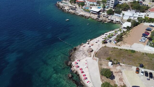 Drone shot of one of the best unknown beaches in the Adriatic sea on the Montenegro coast, gorges, clear water. Hladna uvala, Utjeha