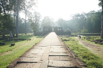 Sunlight and Straight road to Baphuon temple , Angkor Thom, Bayon, Khmer architecture in Siem Reap, Cambodia, Asia, UNESCO World Heritage
