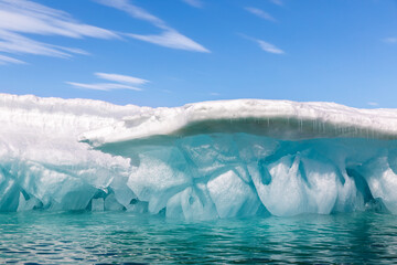 Blue iceberg and blue sky in Svalbard, Arctic Circle