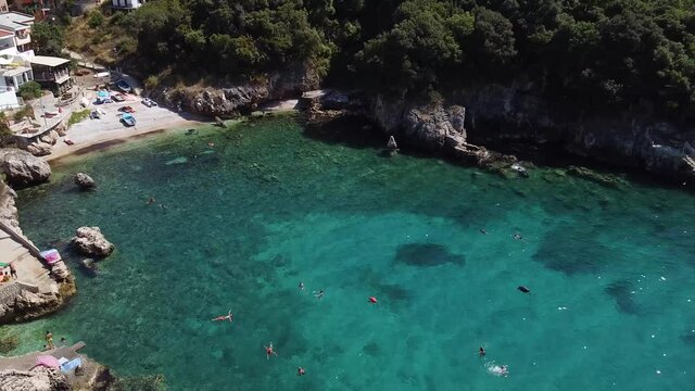 Drone shot of one of the best unknown beaches in the Adriatic sea on the Montenegro coast, gorges, clear water. Hladna uvala, Utjeha