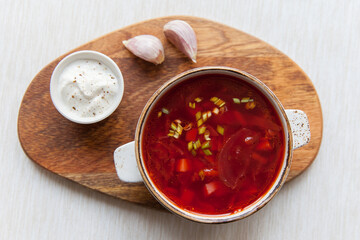 Borscht on a wooden board top view