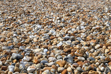 Glatt geschliffene Stein am Strand an der Küste von Cornwell 