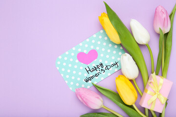 Text Happy Womens Day with tulip flowers on purple background