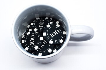 White mug with poker black one hundred chips