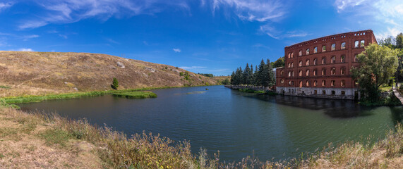 Panoramic view of the landscape around the abandoned mill on the Bank of the Vorgol river in the former estate of merchant Taldykin near the city of Yelets, Lipetsk region, Russia