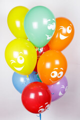 Fototapeta na wymiar a cloud of helium balloons on a white background. 