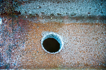 ferro con buco arrugginito e ghiacciato texture