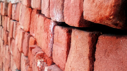 Red brick wall. Texture of old dark brown and red brick wall background