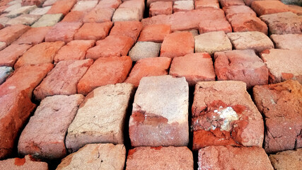 Red brick wall. Texture of old dark brown and red brick wall background